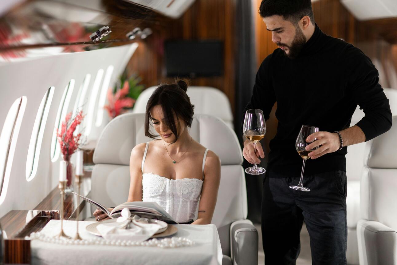 Champagne served in a first class airline cabin