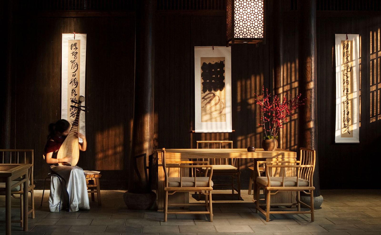 Lamplit tea-house interior at Amanfayun in Hangzhou, the cheapest Aman resort in the world